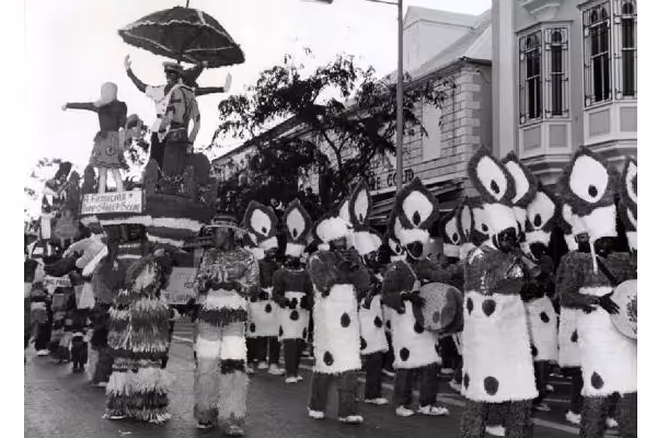 a group of people standing in front of a building