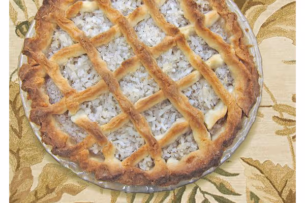 a close up of a coconut tart