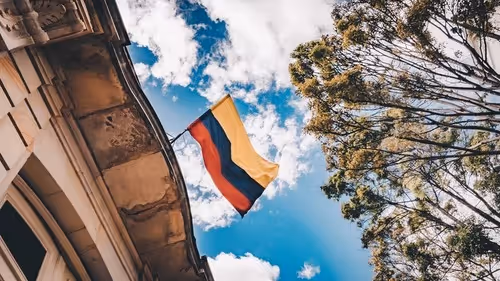 Colombian flag hanging from bulding