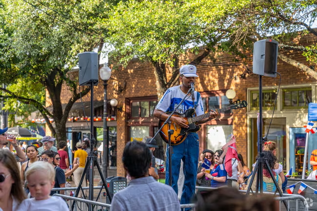Man Playing Guitar in Bishop Arts Festival