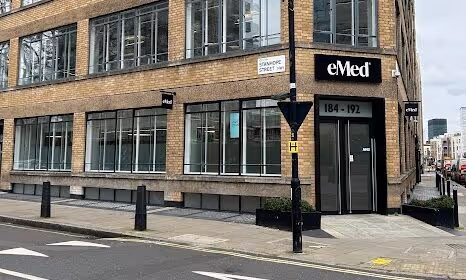 Brick building on corner of Sirdar Street with eMed sign above entrance
