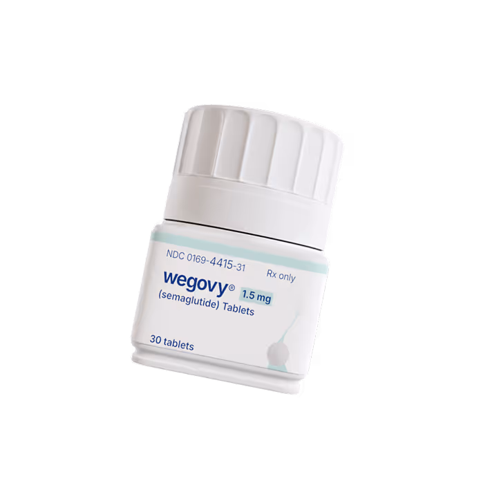 Bottle of Wegovy 1.5 mg semaglutide tablets with scattered white pills.