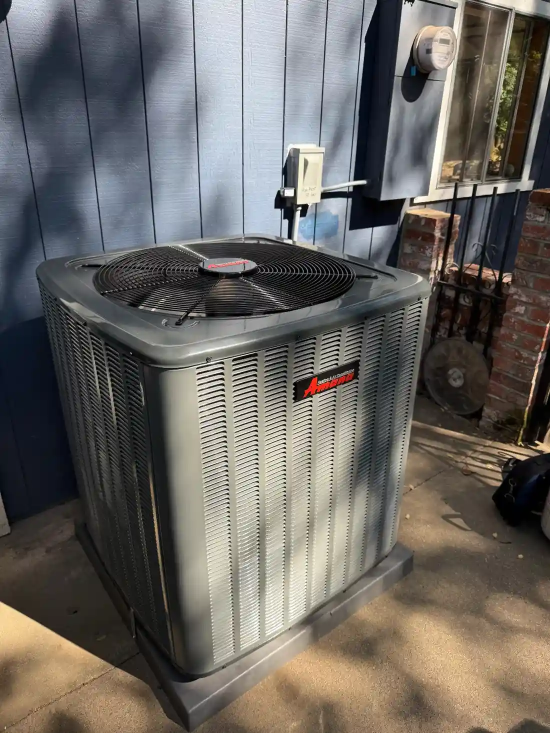 Outdoor Trane air conditioning condenser unit.