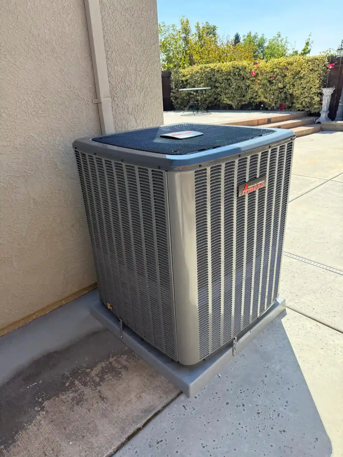 Outdoor Trane air conditioning condenser unit.
