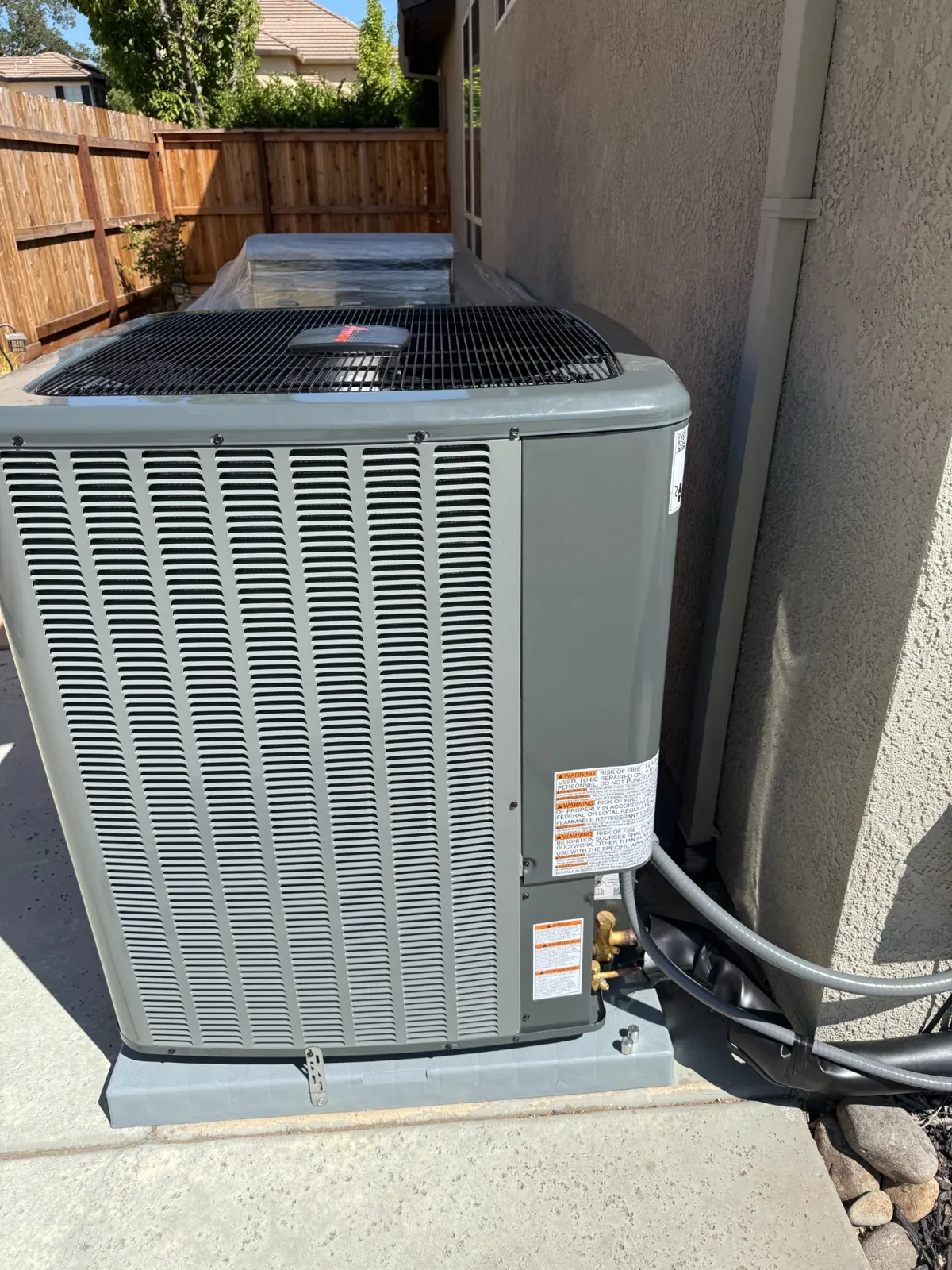 Clean well-maintained outdoor condenser unit in Roseville CA