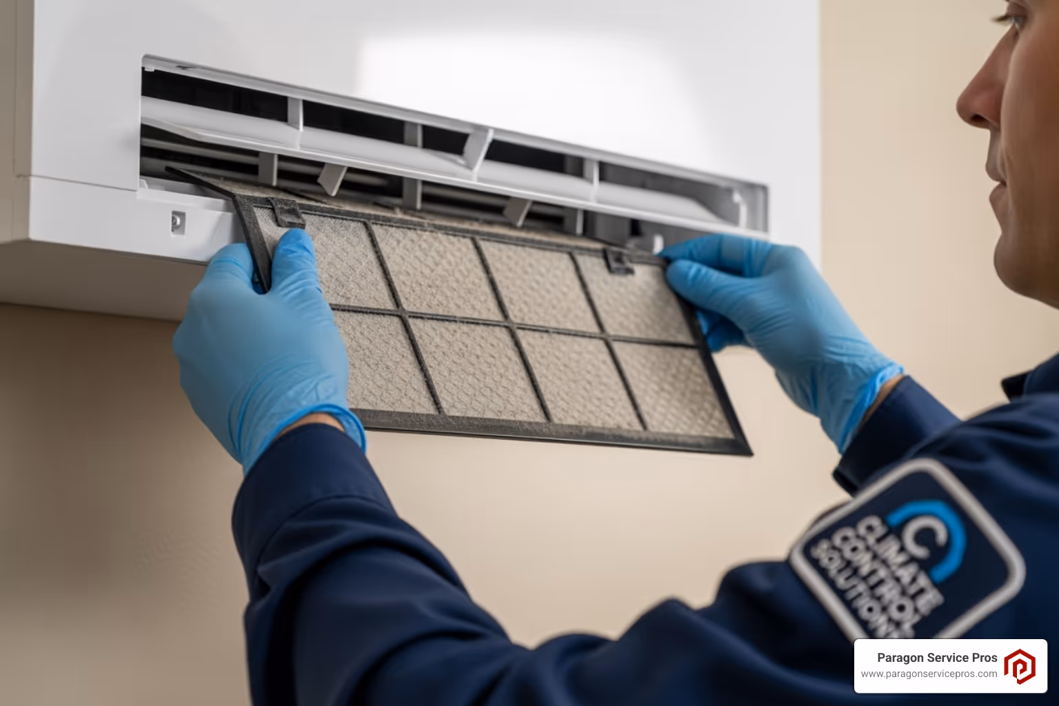 technician cleaning the filter of an indoor mini-split unit - ductless mini split installation american fork, ut