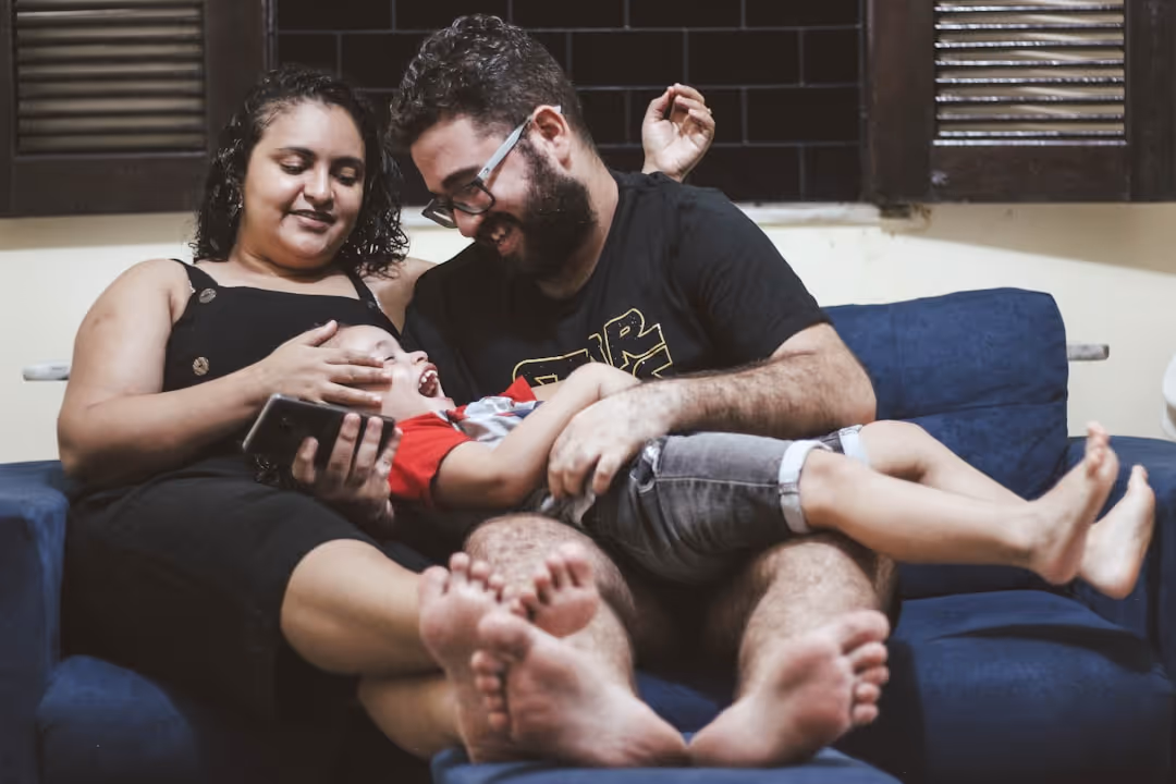 A family relaxing and breathing comfortably in their home - air duct cleaning chandler, az
