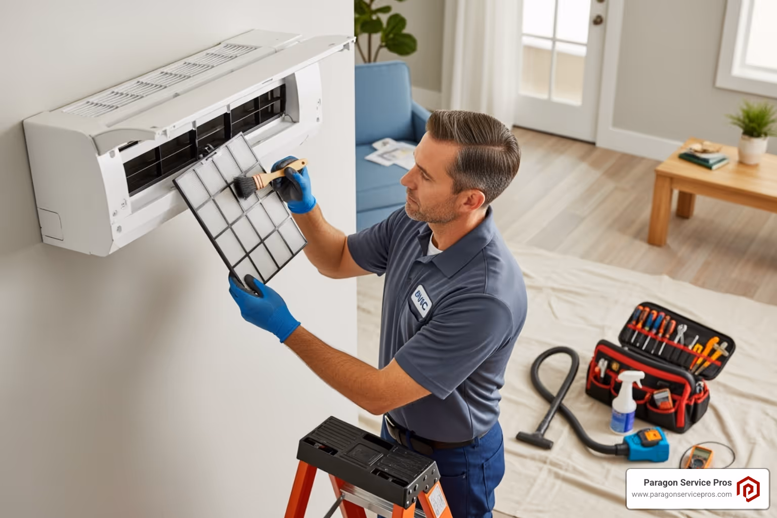 Technician cleaning mini-split filter - ductless mini split installation provo, ut