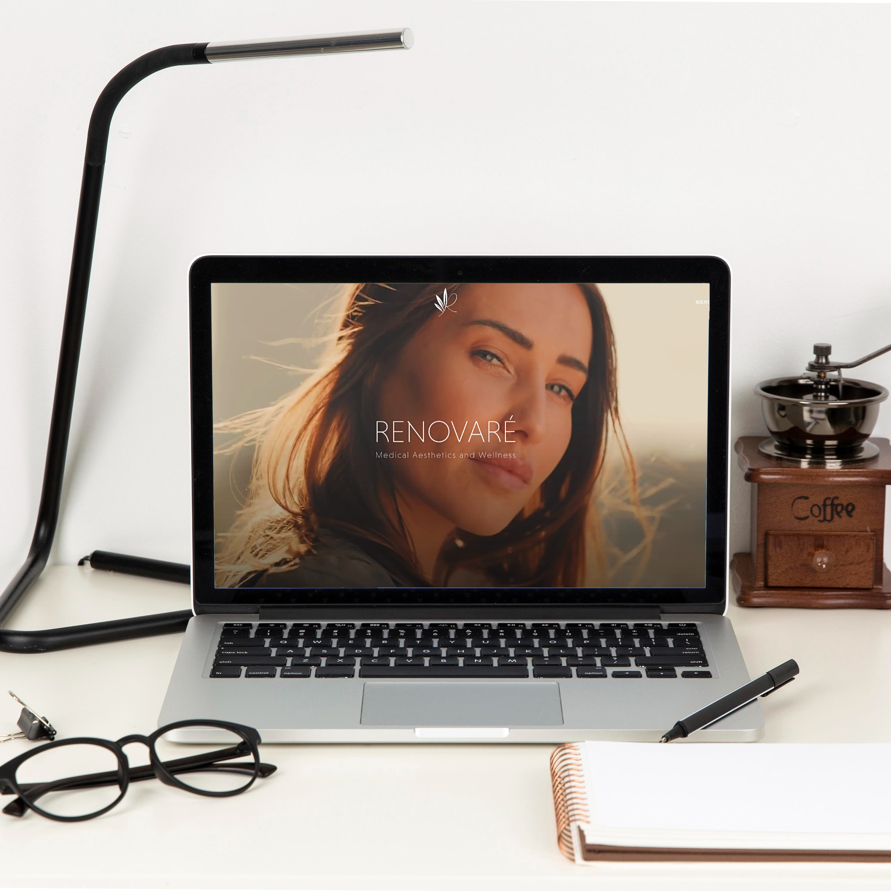 Renovare's website being displayed on a laptop.