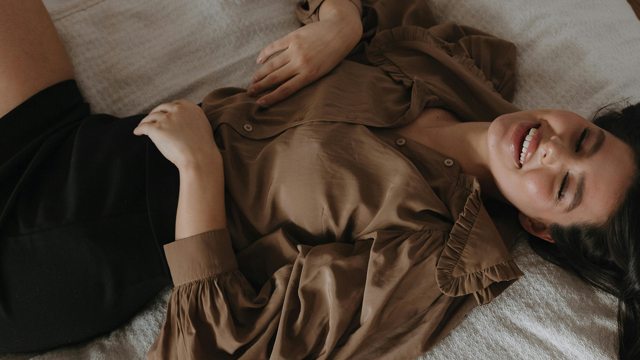 Relaxed woman after non-surgical vaginal rejuvenation therapy.