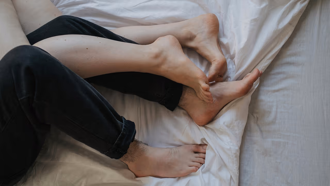 Couple relaxing together symbolizing improved intimacy and vitality through wellness treatments.