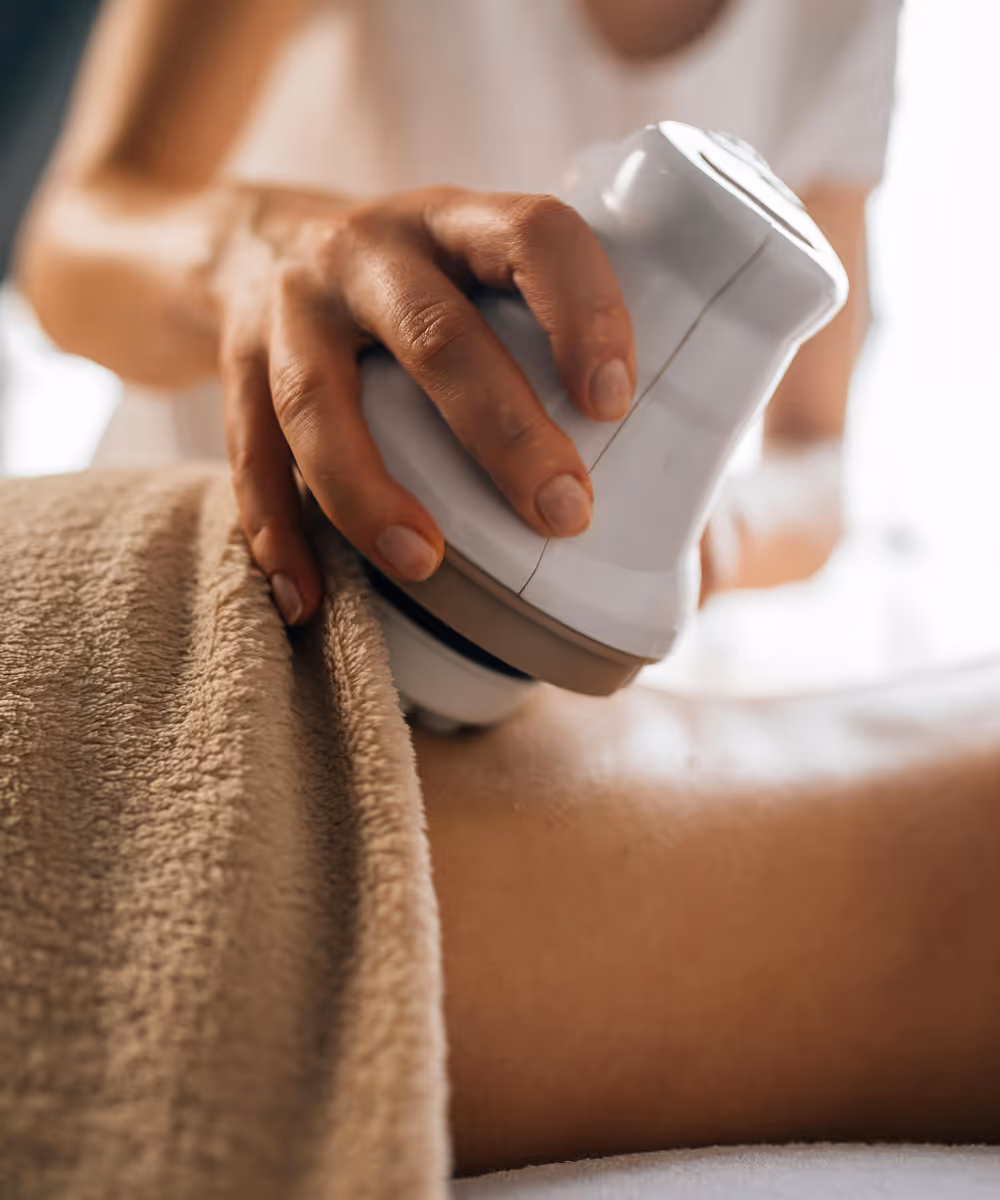 Body contouring treatment using a handheld device on the abdomen.