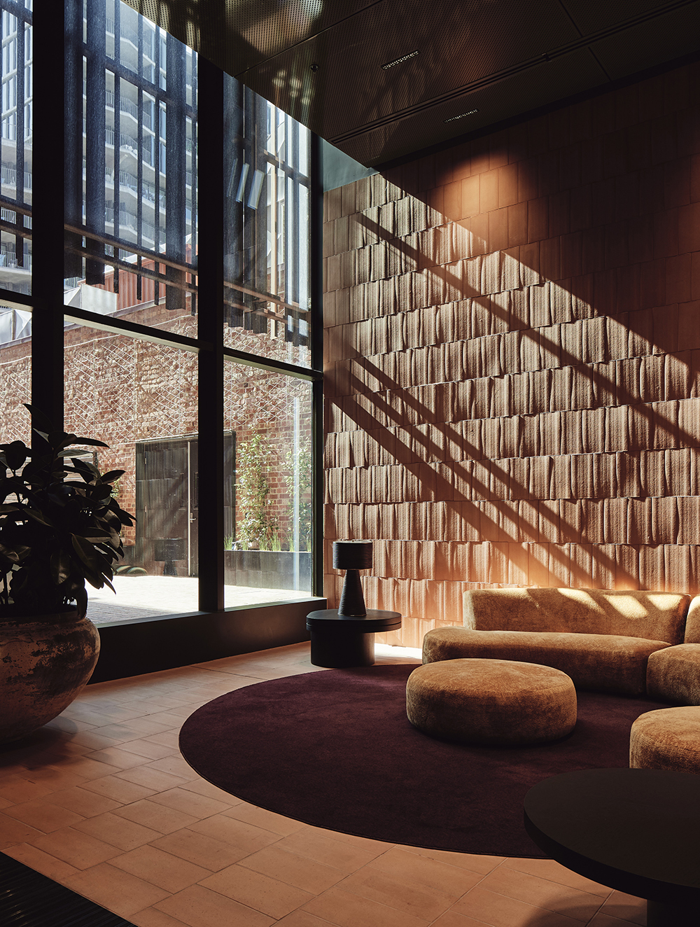 Terracotta tiles in a living room wall and floor design