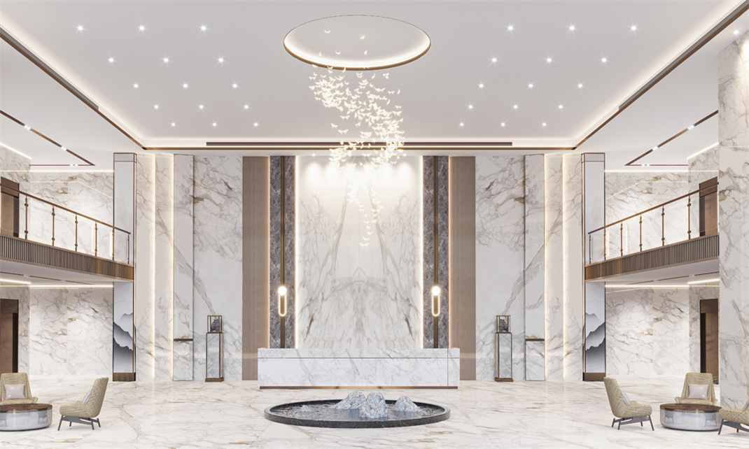 An elegant interior showcasing a grand lobby cladded with calacatta gold marble from walls to floors