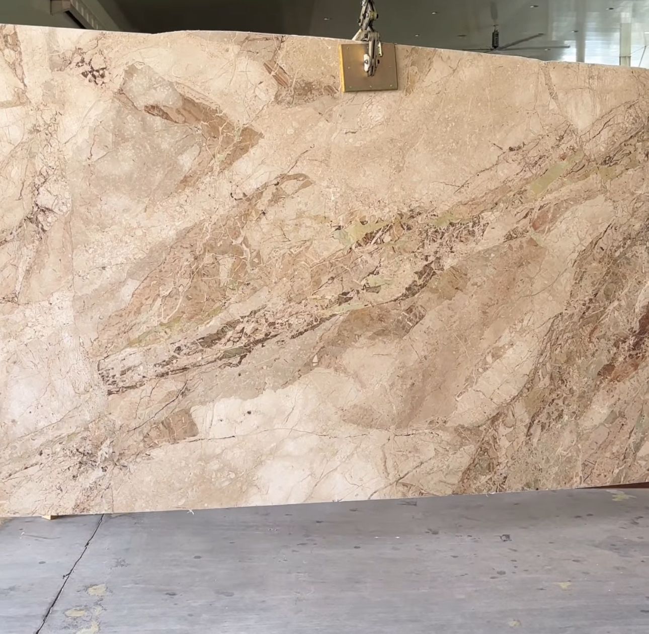A full slab photo of the beige understated stone called monreale marble