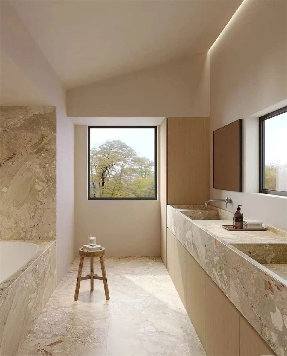 A full understated and elegant bathroom made with monreale marble