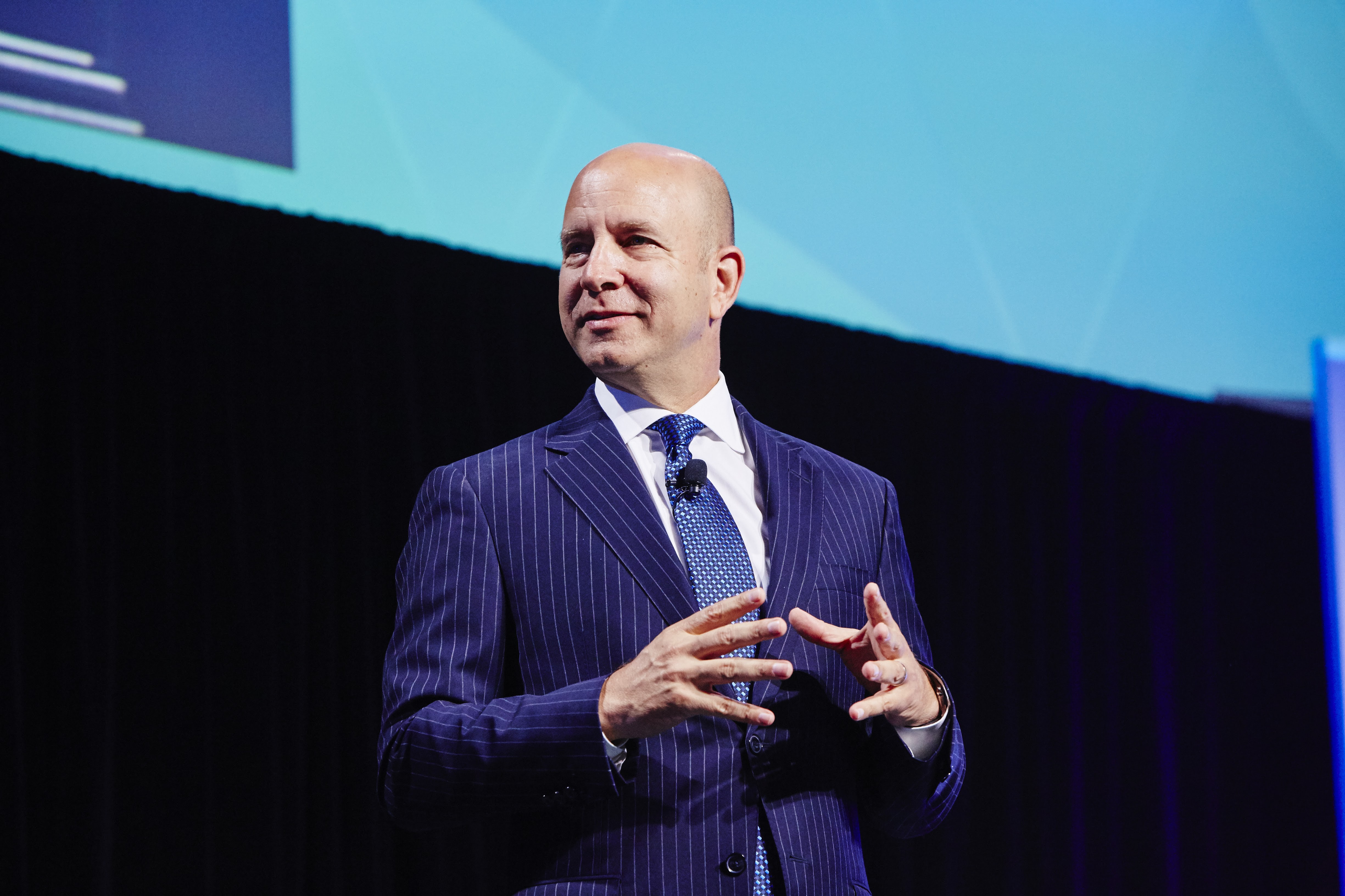 Gary Polson, Cydcor CEO, speaking on stage.