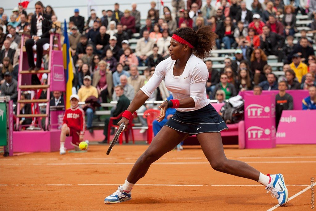 Serena Williams playing tennis.