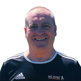 Smiling older man wearing an Adidas shirt with 'We Make Football' logo.