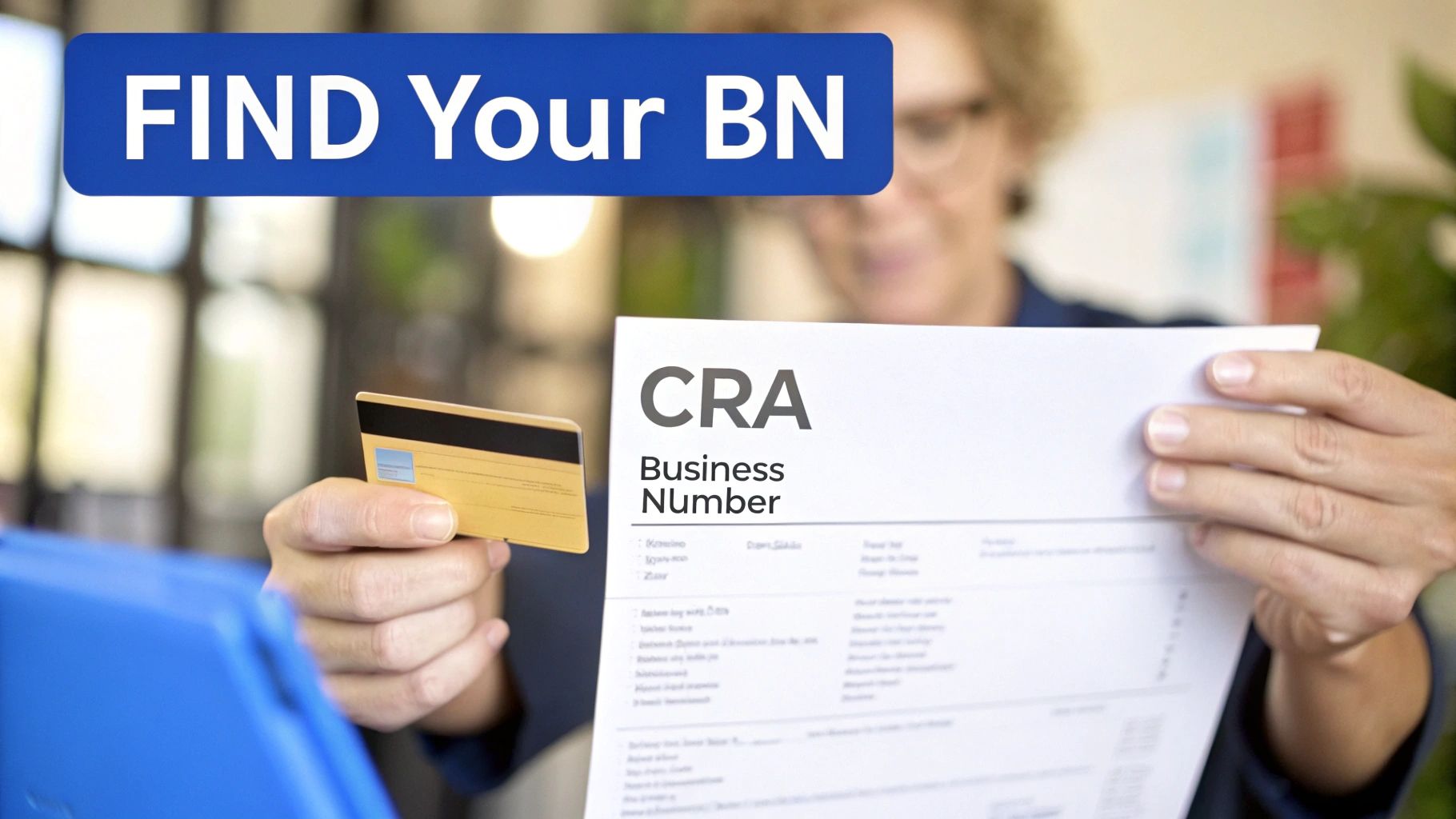 A person holds a credit card and a document showing 'CRA Business Number' with a 'FIND Your BN' banner.