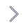 Gray right-pointing arrow icon.