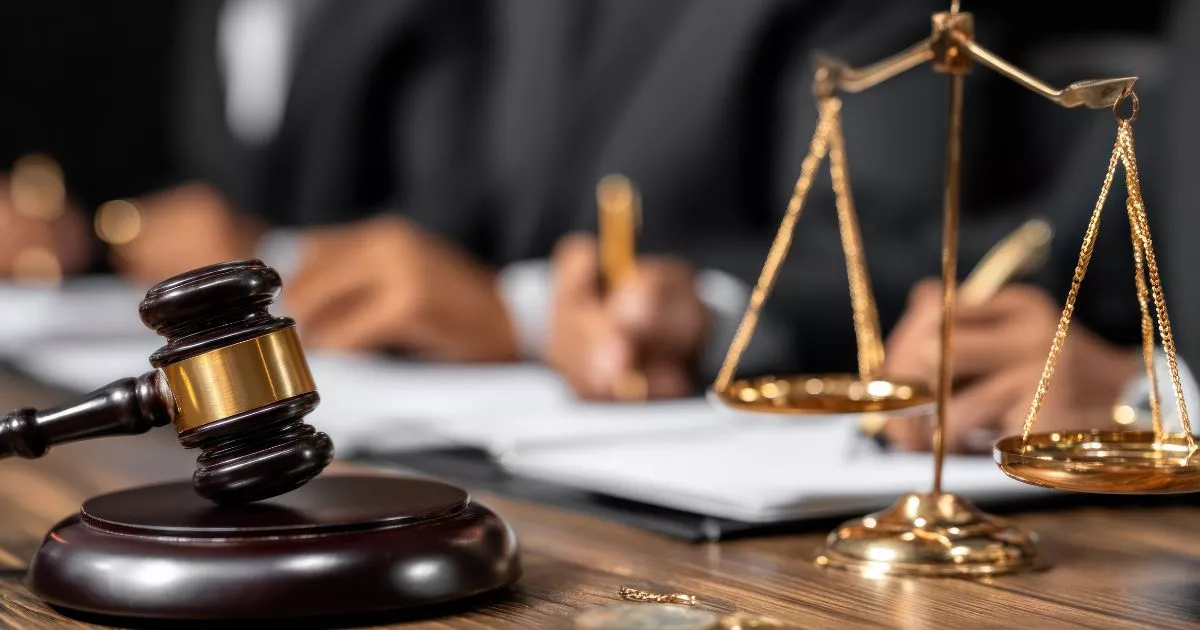 Grayscale image of a robotic arm in a clean, modern environment.