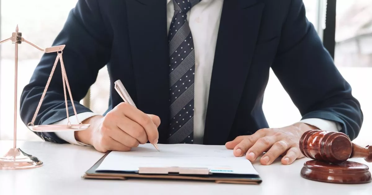 Grayscale image of a robotic arm in a clean, modern environment.