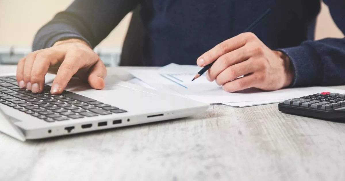 Grayscale image of a robotic arm in a clean, modern environment.