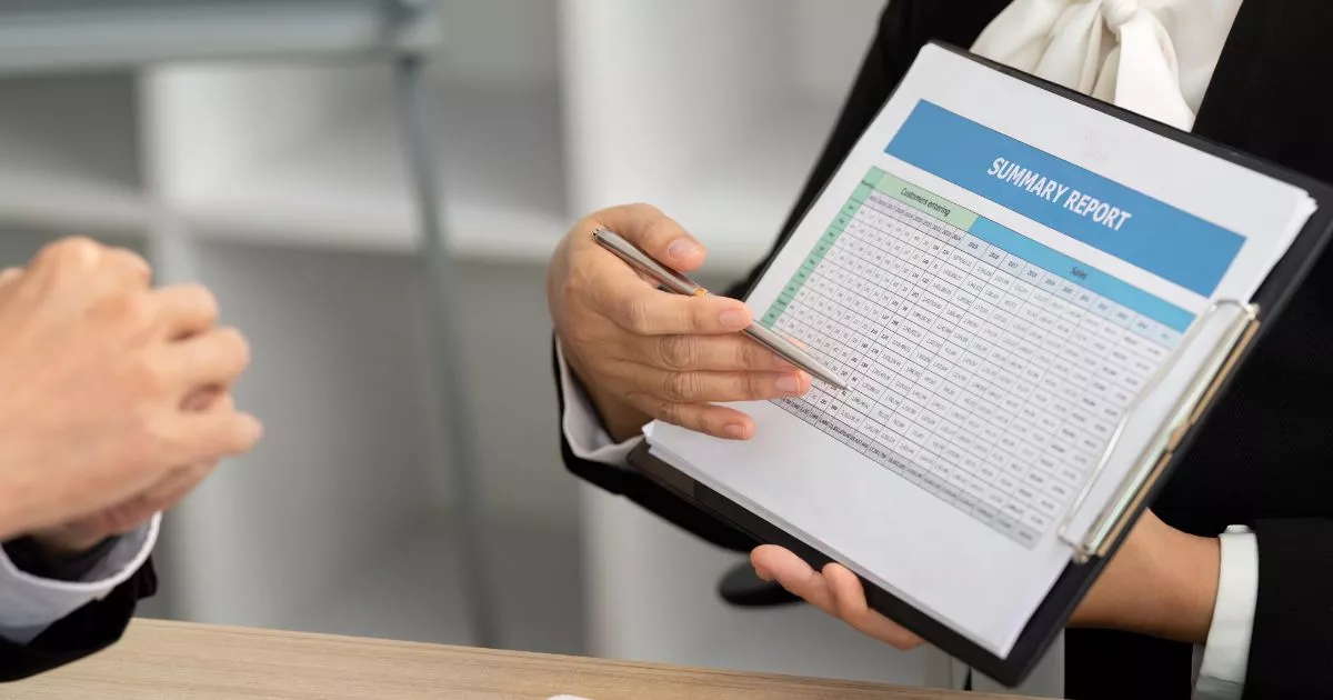 Grayscale image of a robotic arm in a clean, modern environment.