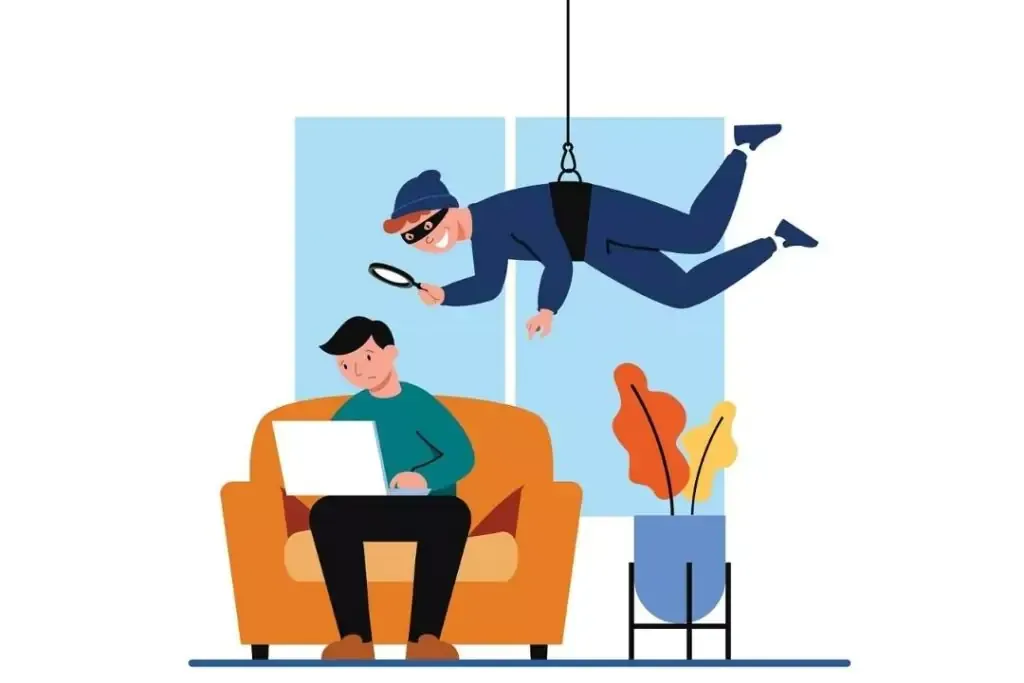 a person peeping into someones computer representing data security issues