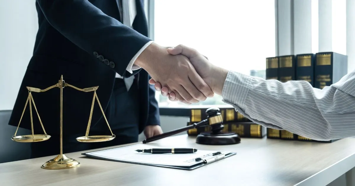 Grayscale image of a robotic arm in a clean, modern environment.