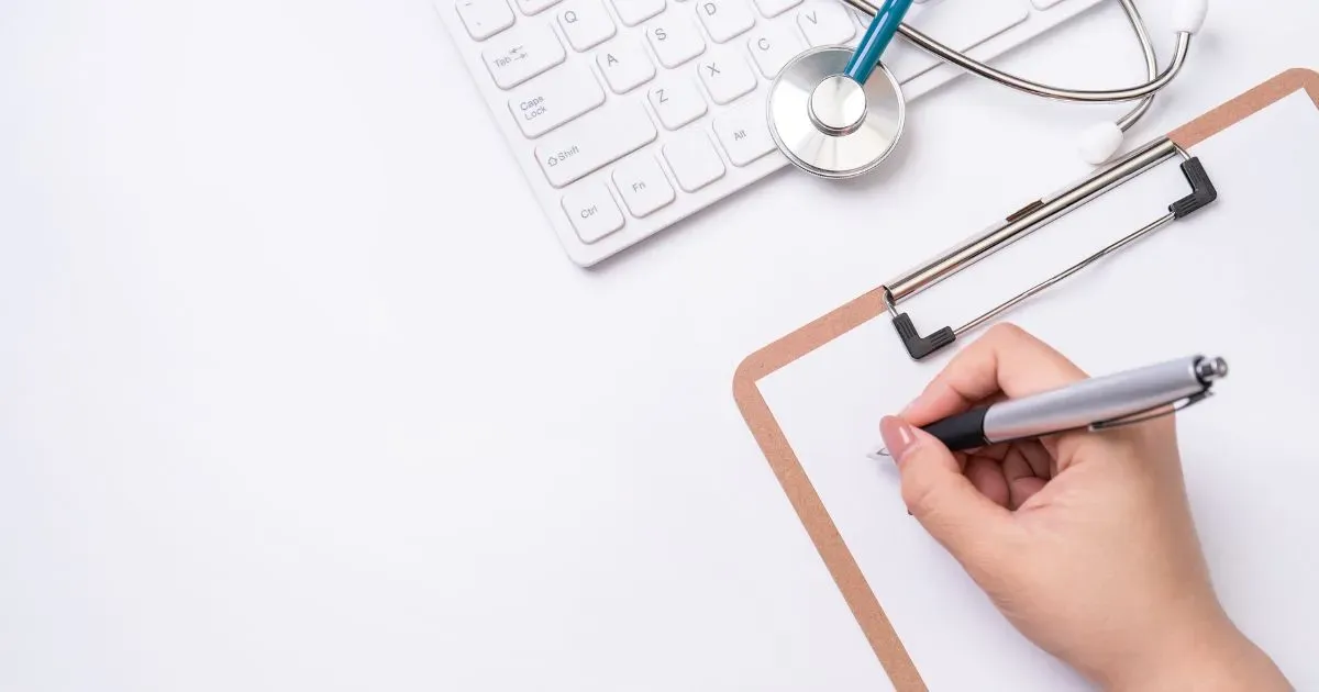 Grayscale image of a robotic arm in a clean, modern environment.