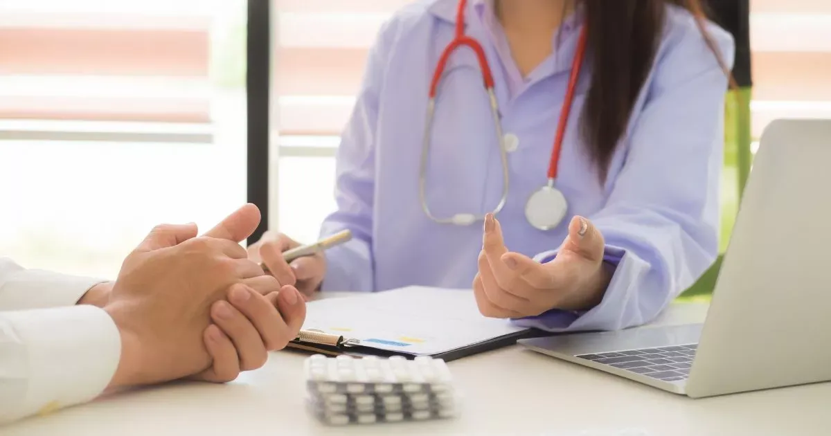 Grayscale image of a robotic arm in a clean, modern environment.