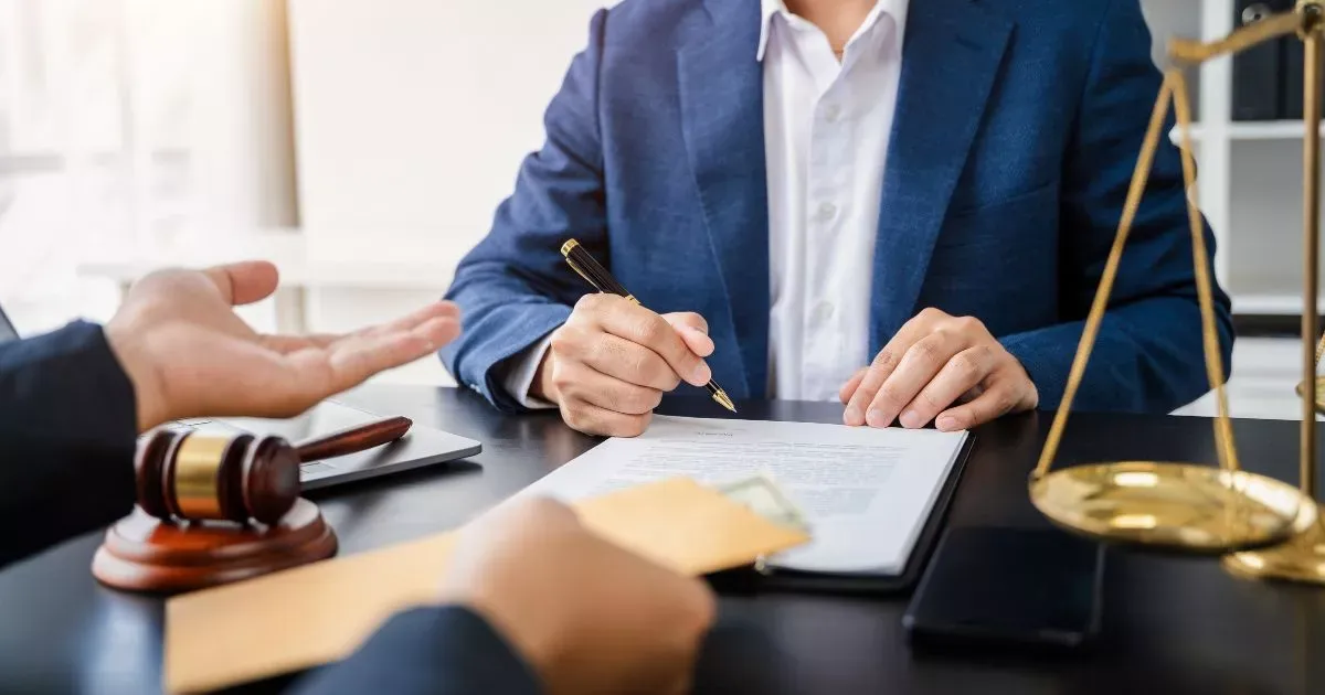 Grayscale image of a robotic arm in a clean, modern environment.