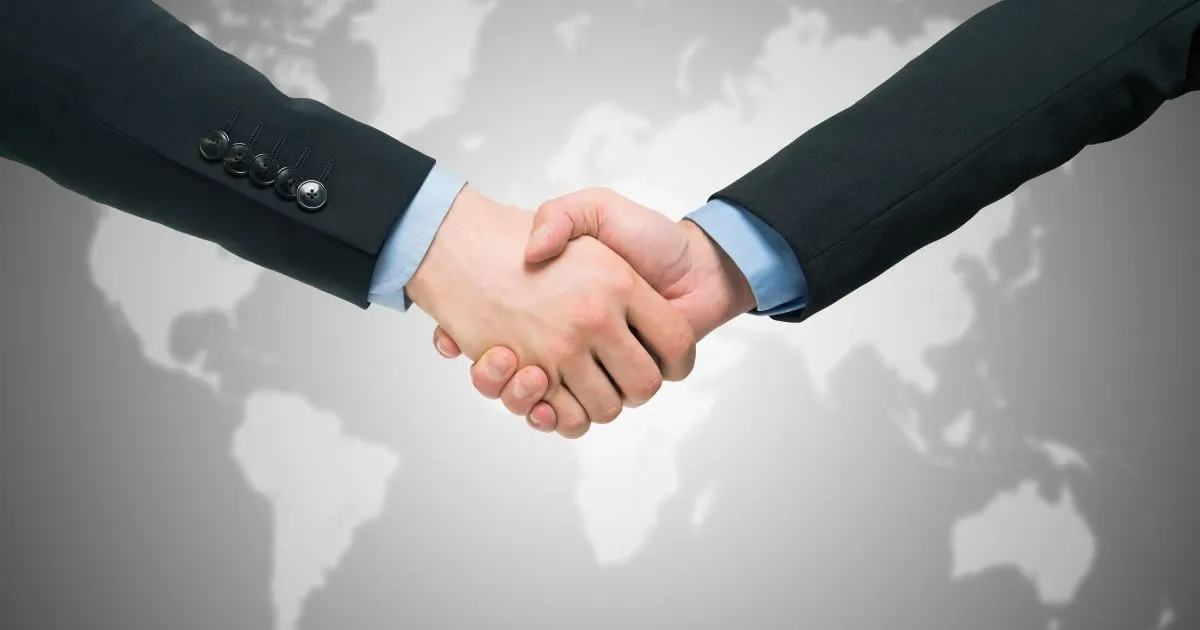 Grayscale image of a robotic arm in a clean, modern environment.