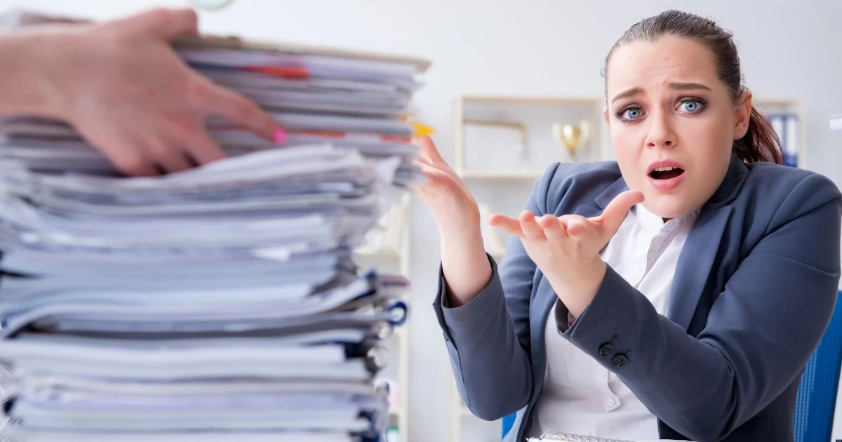 Grayscale image of a robotic arm in a clean, modern environment.