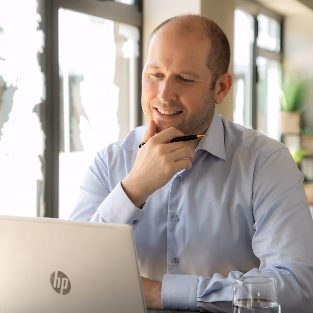 Successful call center operators working together in a modern office environment