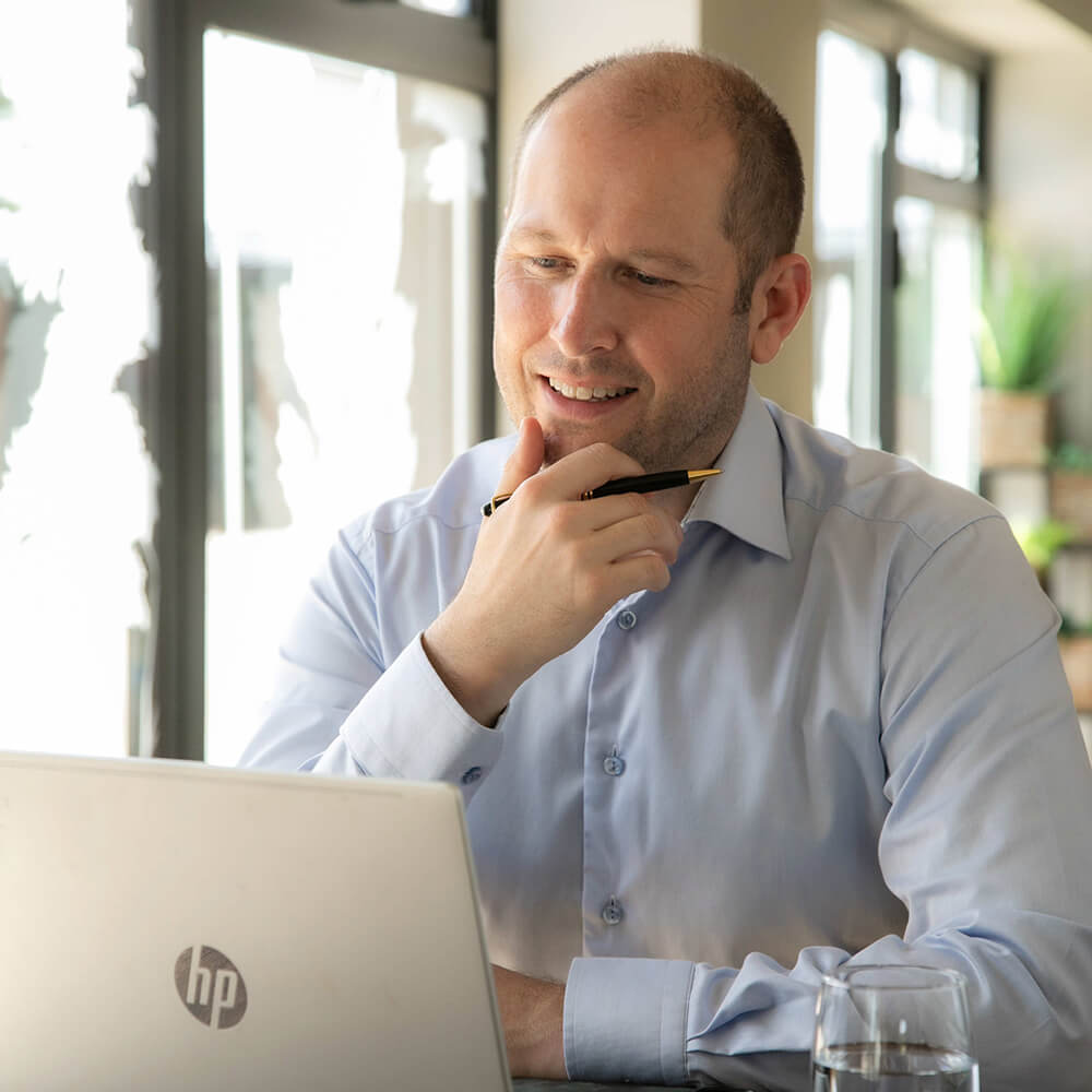 Successful call center operators working together in a modern office environment