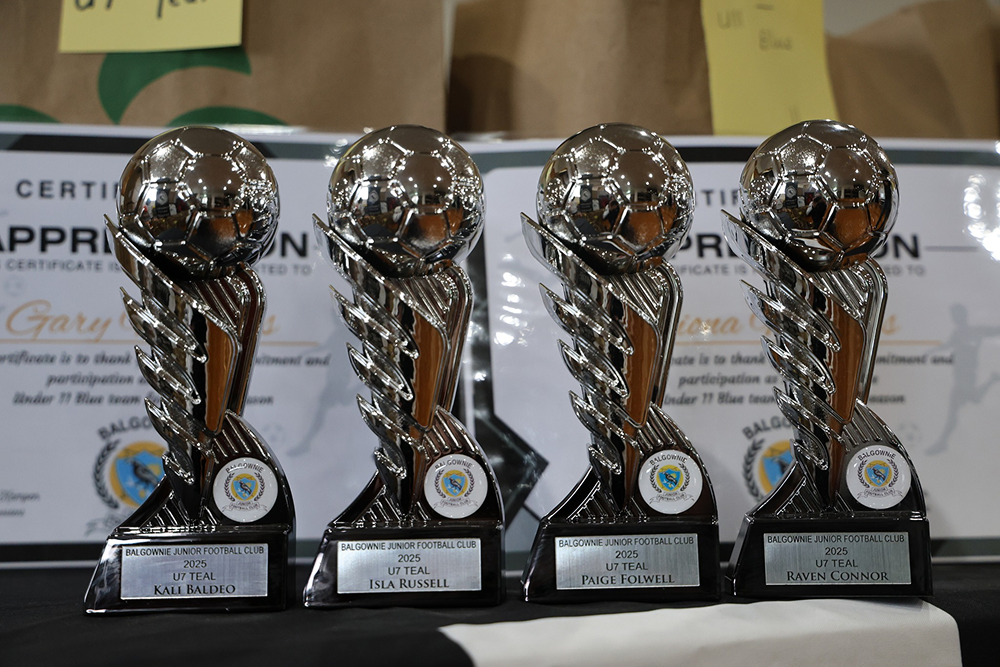 Four silver soccer trophies for Balgownie Junior Football Club 2025 U7 Teal with individual winner names on the plaques.