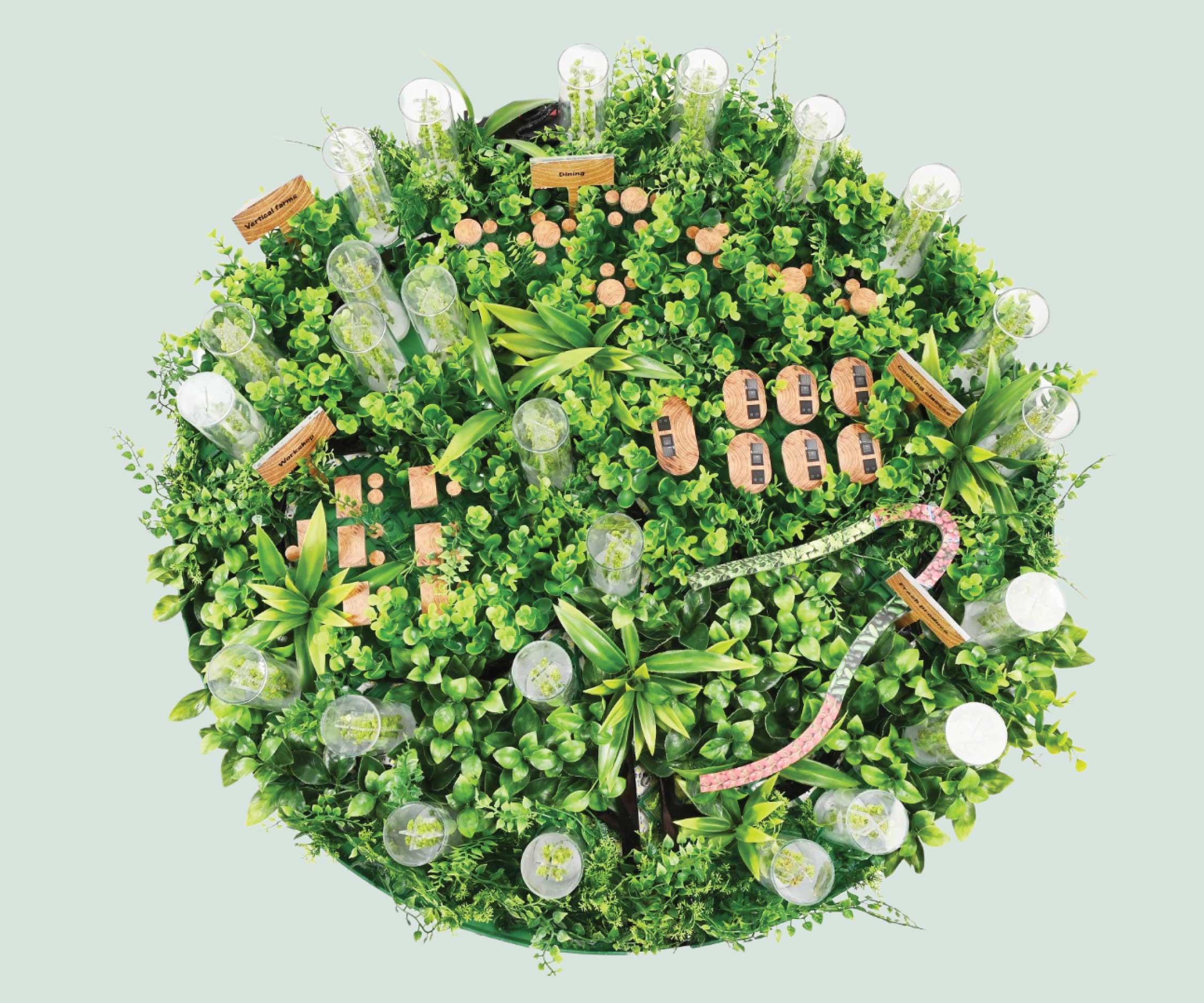 A creative design depicting a planet covered in plants and lush green spaces.