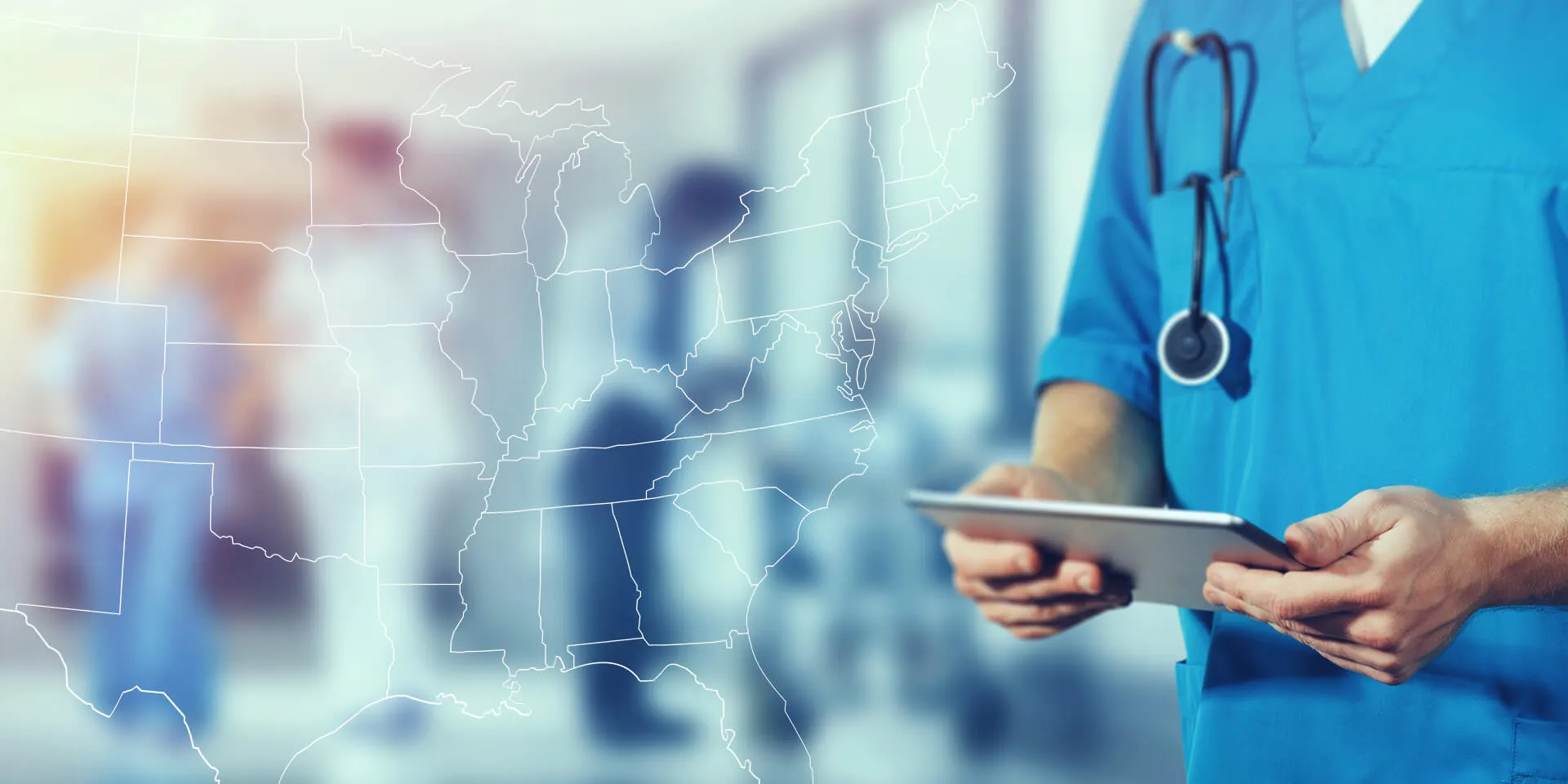 Nurse using a tablet device in a medical setting