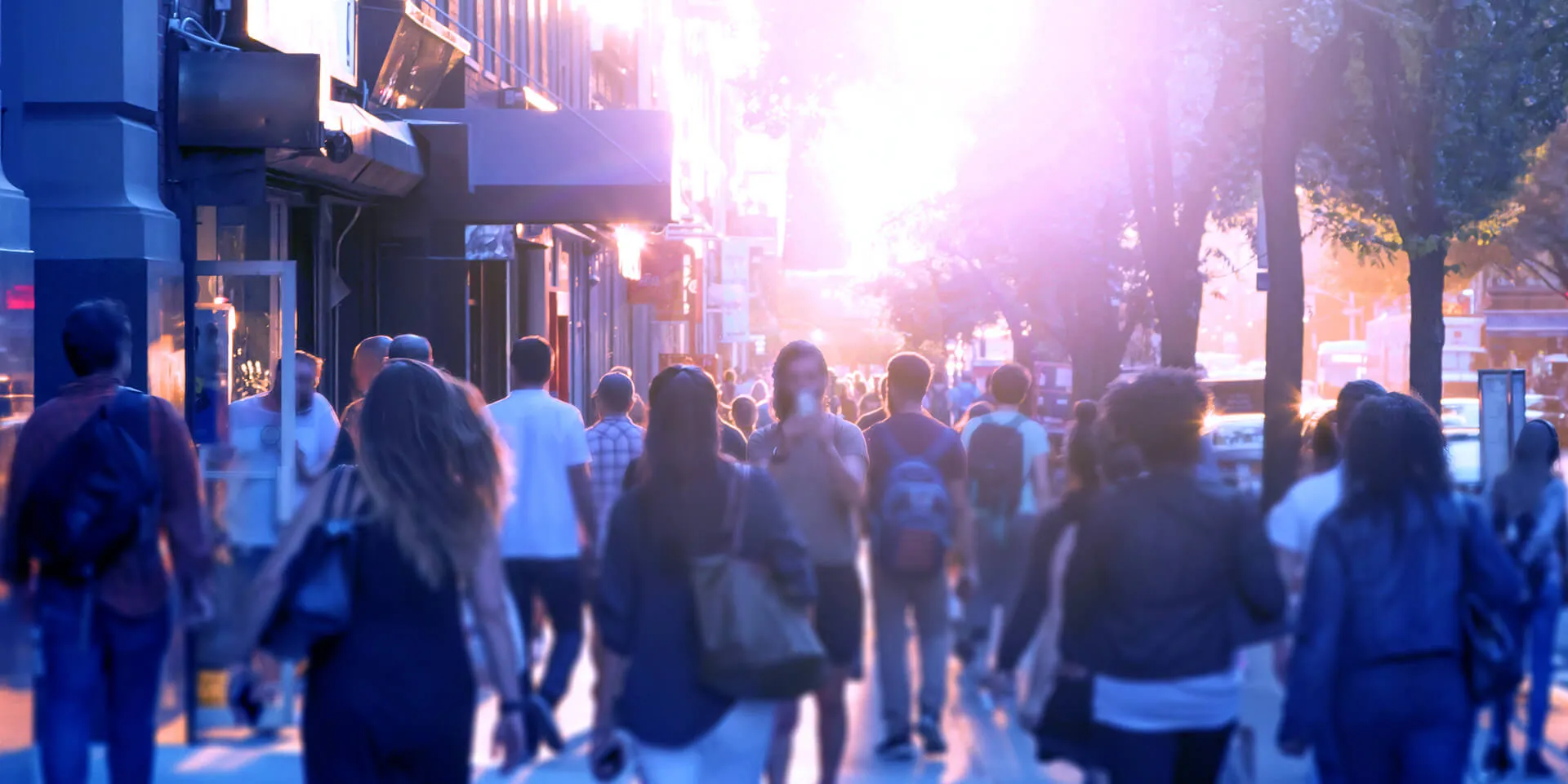 People walking up and down a city street