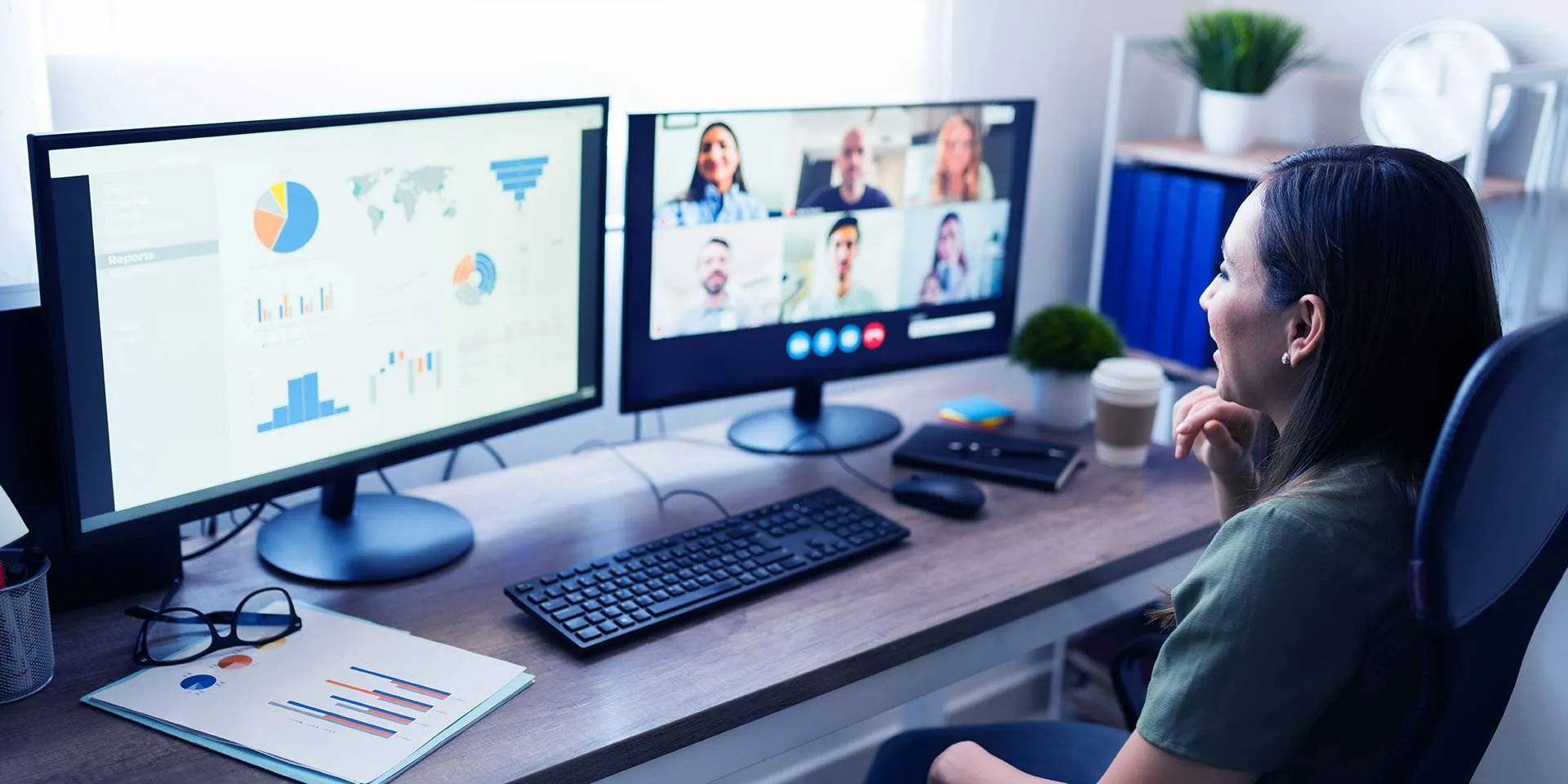 Woman sitting at computer during a meeting