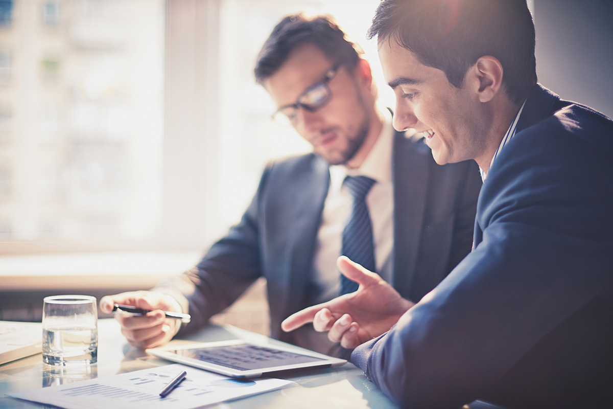 reviewing white paper data on a tablet