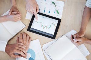 a team reviewing various data sources