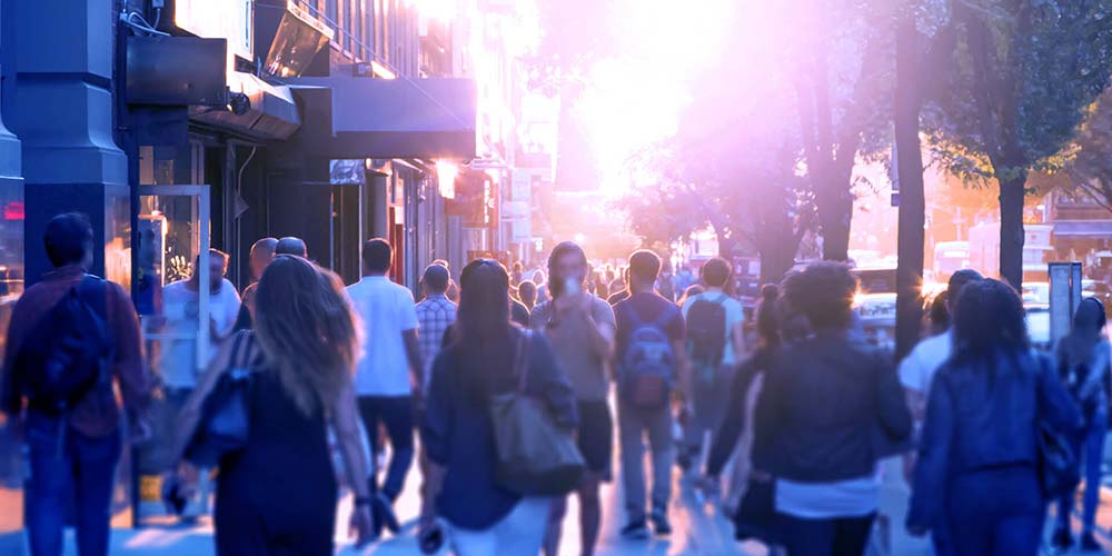 People walking up and down a city street