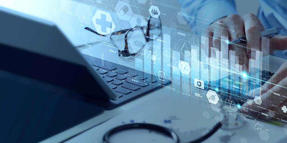 Laptop with data appearing on a futuristic, transparent screen