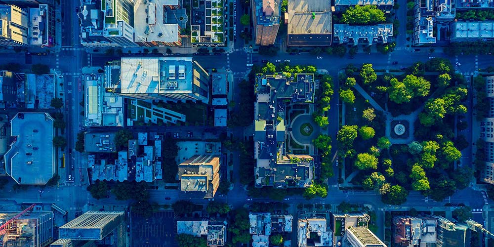 Aerial view of city buildings and a park