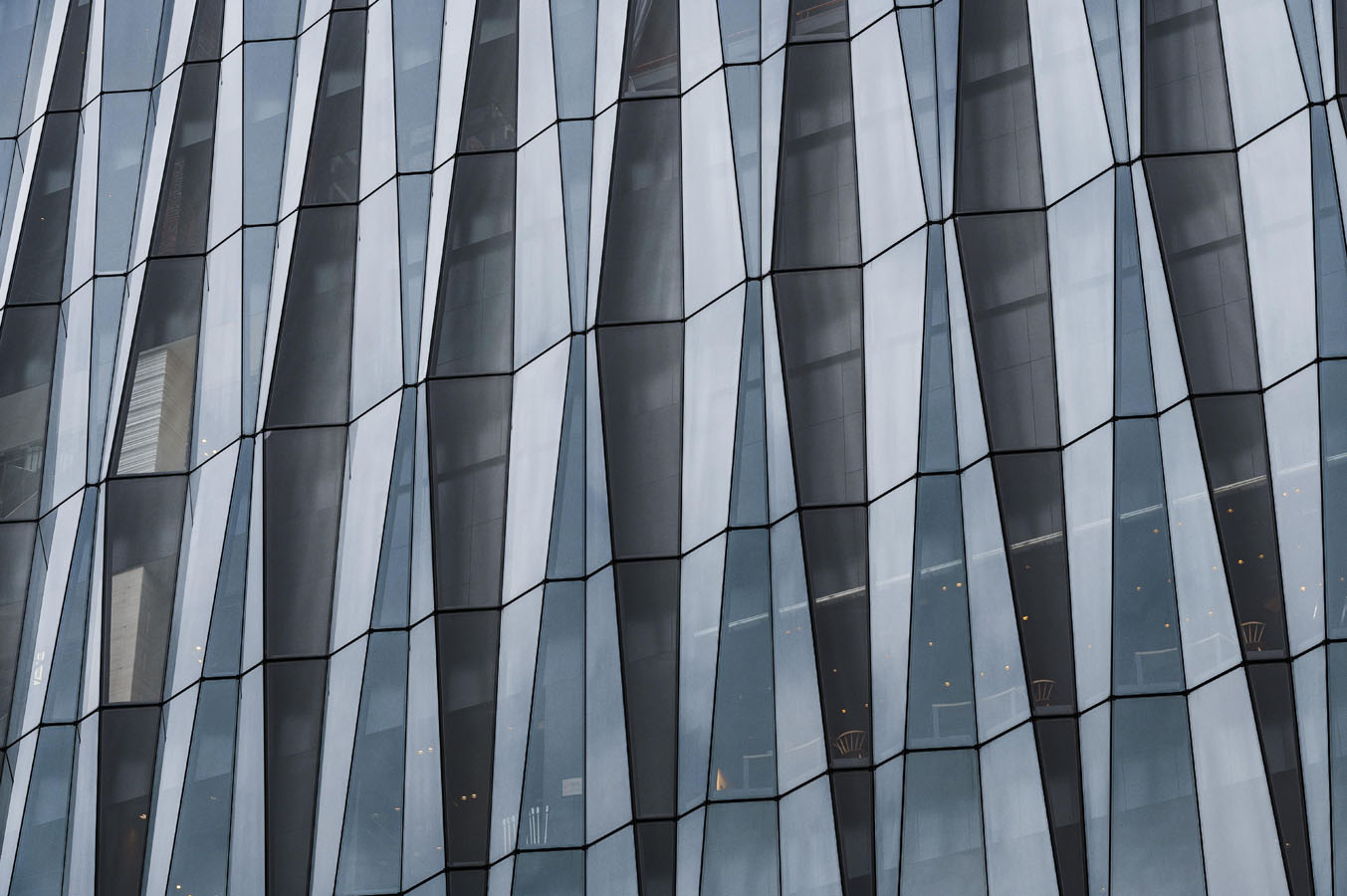 A tall building with a clock on the side of it.