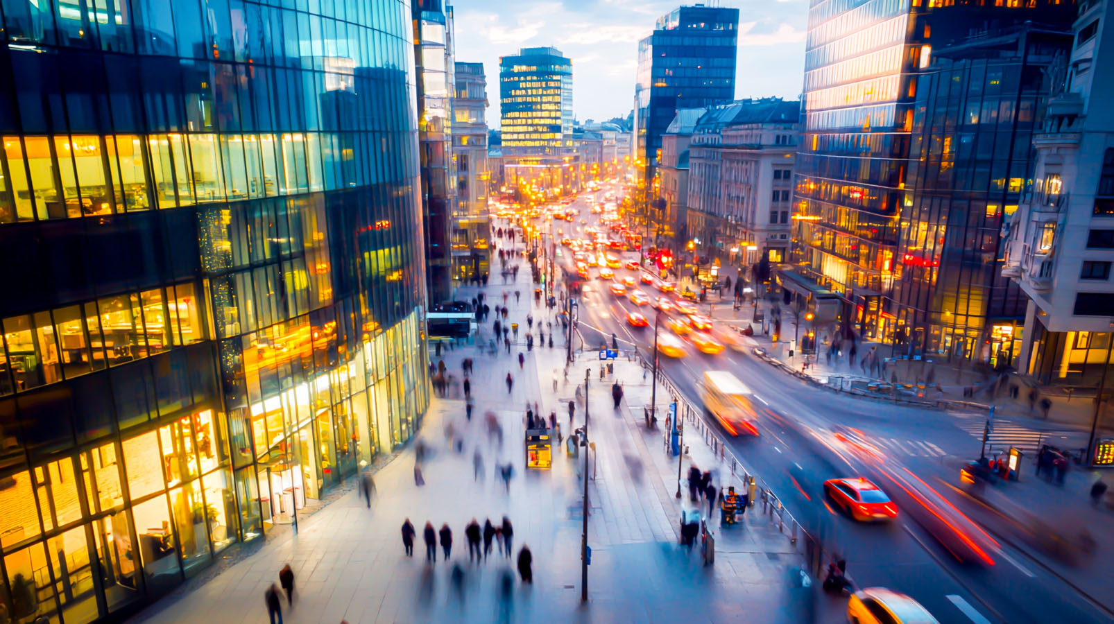 A busy city street filled with lots of traffic.